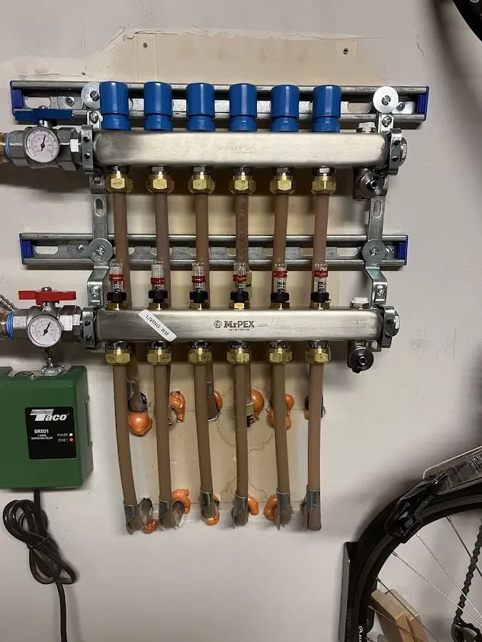 Plumber performing Gas Line Installation at a residential property in Martinsville